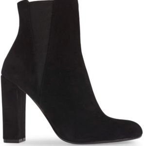 Heeled black booties
